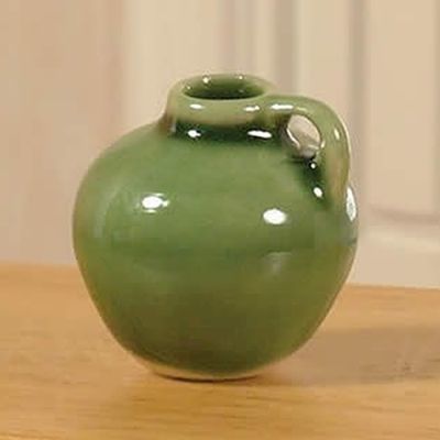 Green Glazed Earthenware Jug                                